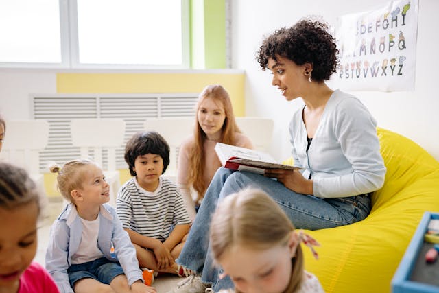 teacher giving lesson to students in classroom